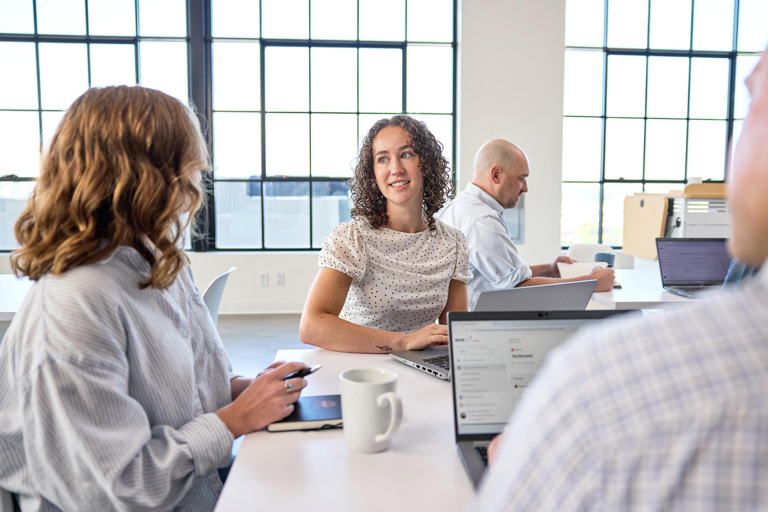 Full-Color-Group-of-People-Talking-at-a-Table2 Size Optimized
